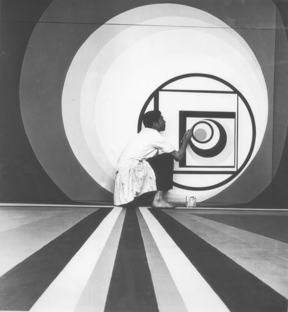 New Waves - A student preparing the exhibition of students' works in the Fine Arts Gallery of the Arab League Park, organized by the Casablanca School of Fine Arts, June 1968. Photo M. Melehi. Archives Chabâa family