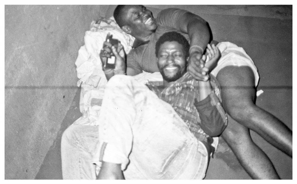 Sabelo Mlangeni, Afternoon Visit, Ola and I Playing Nipple (Photo by Sodiq) from the series The Royal House of Allure (2019)